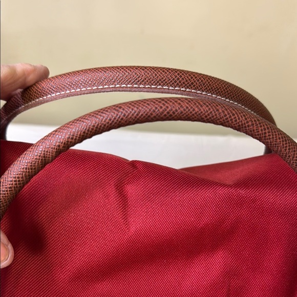 Red and Brown Travel Bag with Adjustable Strap and Sturdy Design - Picture 2 of 10